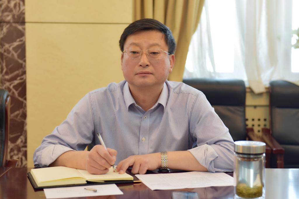 副校长何松林主持